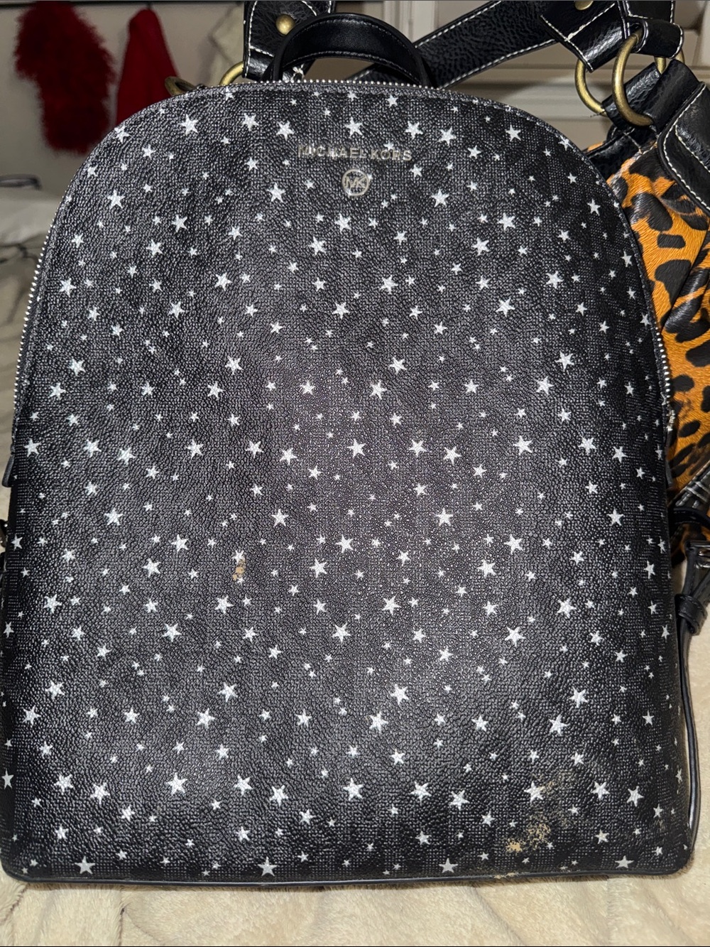 Michael Kors Black Star Pattern Leather Backpack with Gold Logo
